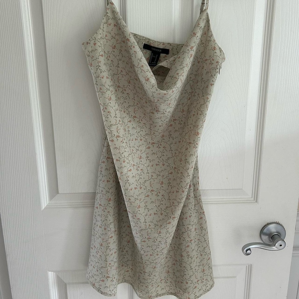 Light green floral slip dress.